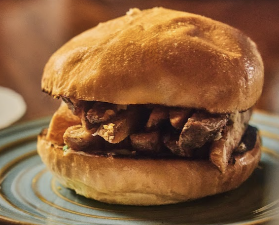 The Dandelion signature dishes The Dandy BurgerDandelion Turkey Club SandwihFish and Chips